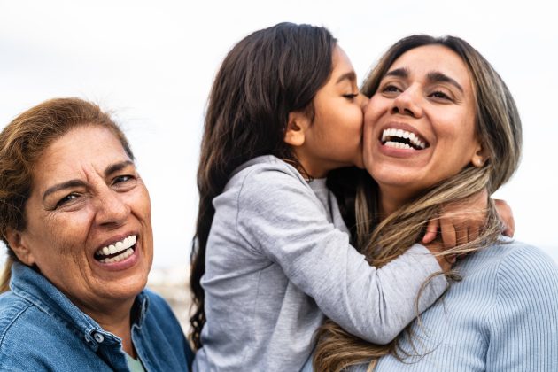 breaking generational trauma; a grandmother, mother, and daughter, three generations, all smiling